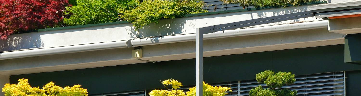 Modern Ohio apartment building with green landscaping, representing rental housing in Ohio 