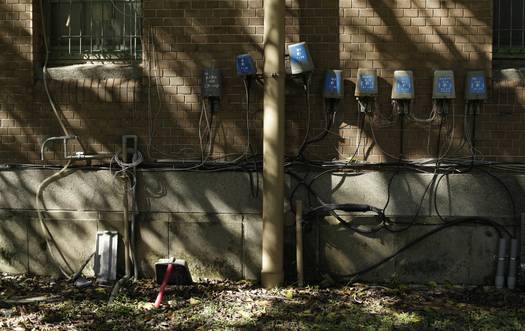 Water and electric meters in an Ohio apartment, symbolizing utility responsibilities in rental agreements