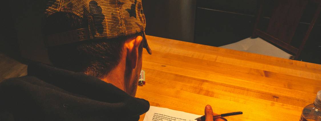 Tenant and landlord at a table signing a rental agreement in an Ohio apartment, representing legal rights and obligations under Ohio landlord-tenant law