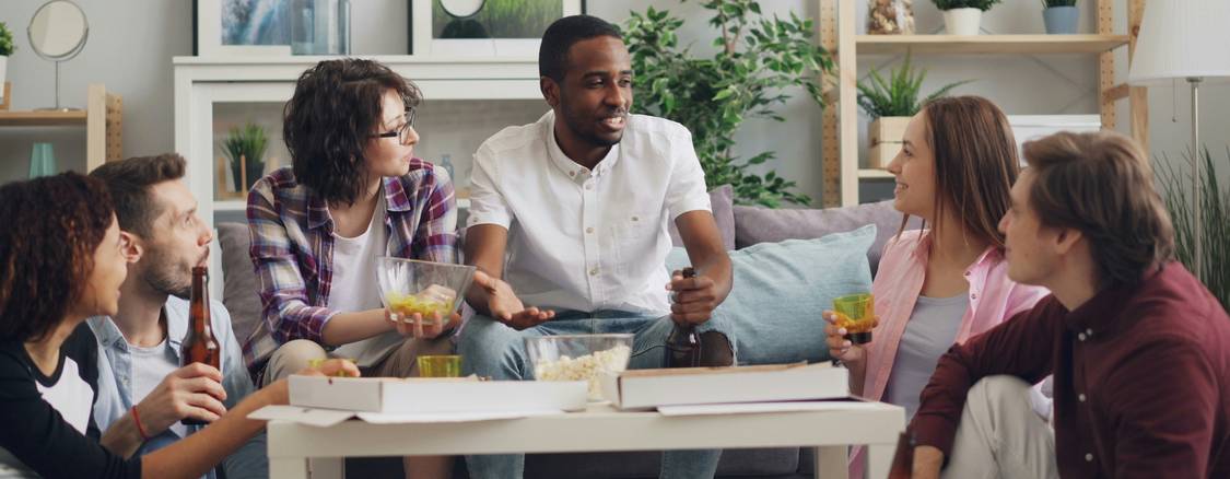 Roommates discussing shared living arrangements in an Ohio apartment, representing the importance of clear agreements and legal rights